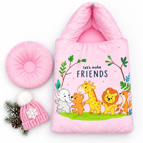 A pink padded sleeping bag or soft pouch with a cartoon animal scene and the words 'let's make FRIENDS,' shown on a white background with a matching pink round cushion and a pink knit hat with a white snowflake and pom-pom.